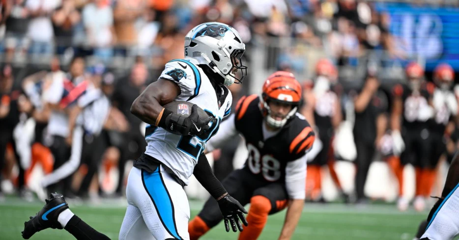 Panthers’ Xavier Woods fined for a late hit on Bengals’ Mike Gesicki