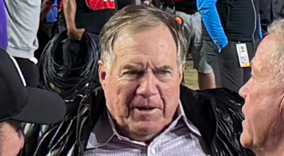 PHOTO: Social Media Was Cracking All Sorts Of Ruthless Jokes About Bill Belichick Busting Out Of His Tight Dress Shirt While On The Field With His Girlfriend At LSU-Vandy Game