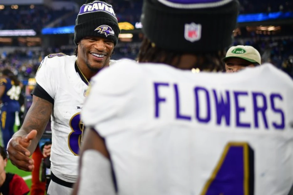 Zay Flowers crashed Lamar Jackson's postgame interview to knight QB with 'Top 10' chain