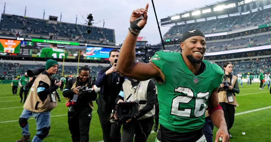 Saquon Barkley admits he didn’t know “hat and t-shirt” games were a thing until winning his first NFC East title