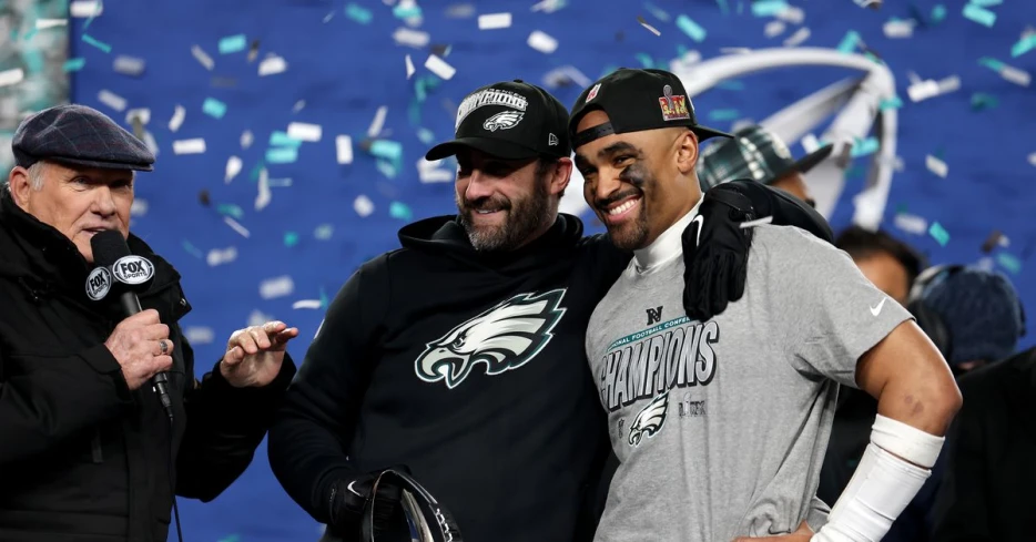 Nick Sirianni celebrates Jalen Hurts on stage after NFC Championship win