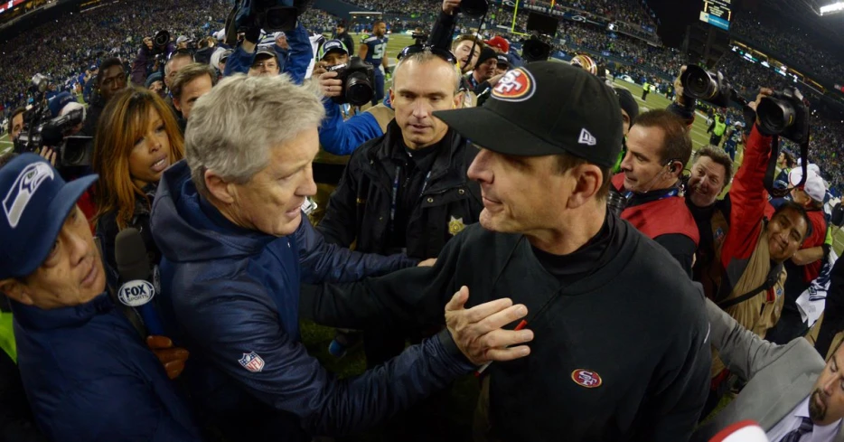 Jim Harbaugh’s Chargers block a coaching interview for Pete Carroll’s Raiders