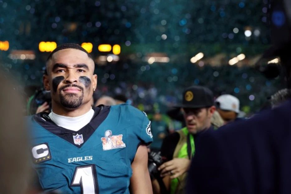 Jalen Hurts silently standing in confetti after the Eagles' Super Bowl win is the coldest photo