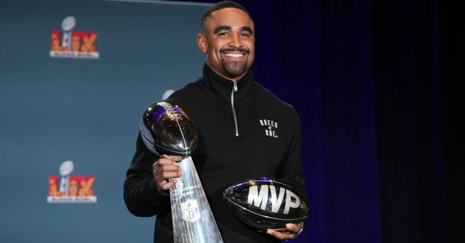 Super Bowl MVP Jalen Hurts celebrates at Disney World