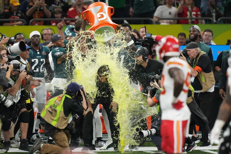 WATCH: Eagles Stars A.J. Brown, DeVonta Smith Give HC Nick Sirianni Gatorade Bath After Blowing Out Chiefs in Super Bowl 59