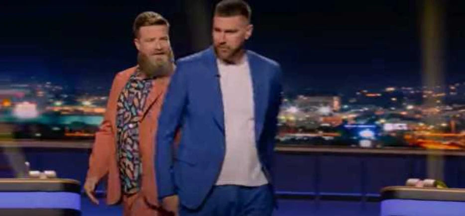 Travis Kelce got the heartiest butt slap from Ryan Fitzpatrick on Are You Smarter Than a Celebrity?