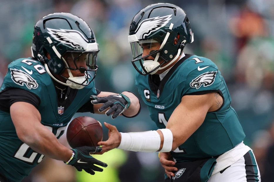 WATCH: Jalen Hurts, Saquon Barkley Shared Special Moment on the Sideline During Super Bowl Win vs. Chiefs