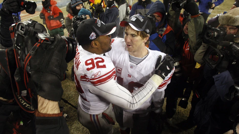 Giants legend Michael Strahan duking it out with Eli Manning for ownership stake