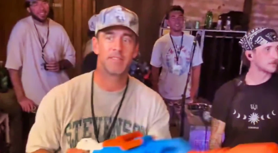 Aaron Rodgers Sparks More Marriage Rumors After Social Media Detectives Noticed Something Interesting About His Hand As He Squirted Water Gun During Concert