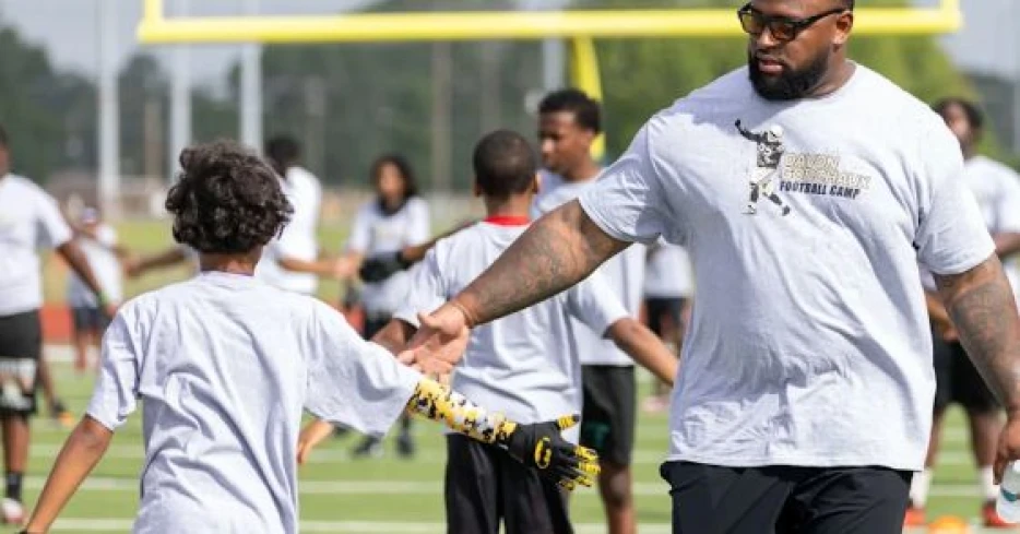 Saints DT Devon Godchaux hosts 9th annual youth football camp