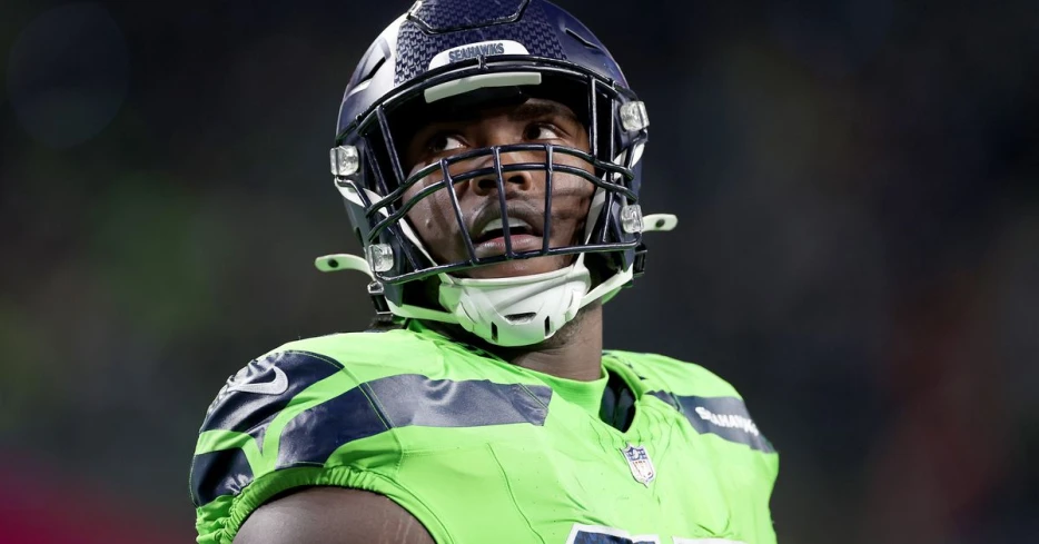 Who started on the Seahawks o-line with Charles Cross out