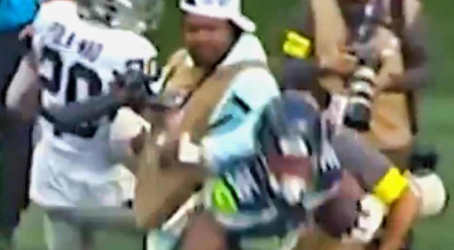 Cameras Caught Marshawn Lynch Delivering Vicious Elbow To The Back Of Seahawks RB While Working As Sideline Photographer During Preseason Game