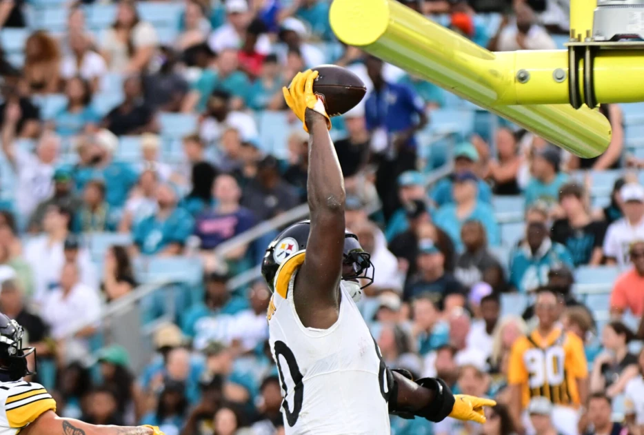 Steelers TE Darnell Washington Defends Celebratory Dunk Despite Penalty: ‘No Harm’