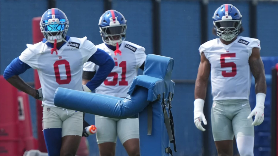 Giants’ Abdul Carter gets rookie treatment from Brian Burns in front of reporters