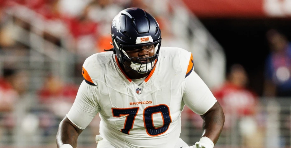 Broncos have waived offensive lineman Marques Cox