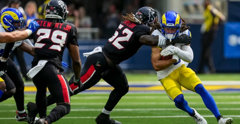 Texans lose slug fest, fumble away game against Rams 14-9