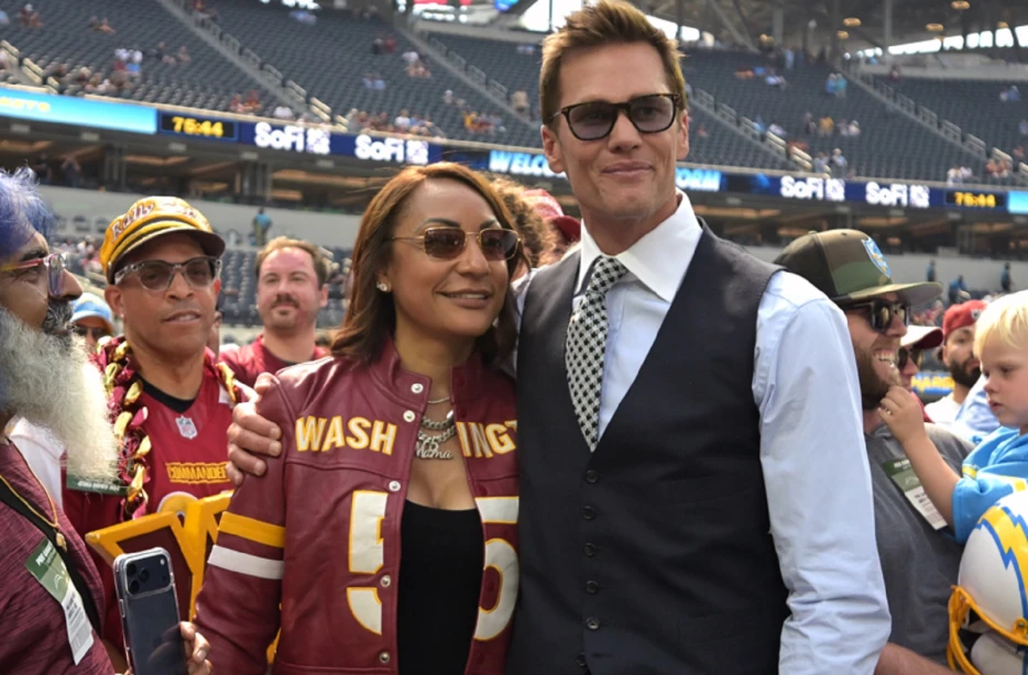 Tom Brady Goes Viral After Chatting Up Jayden Daniels’ Mom Before Game (Video)