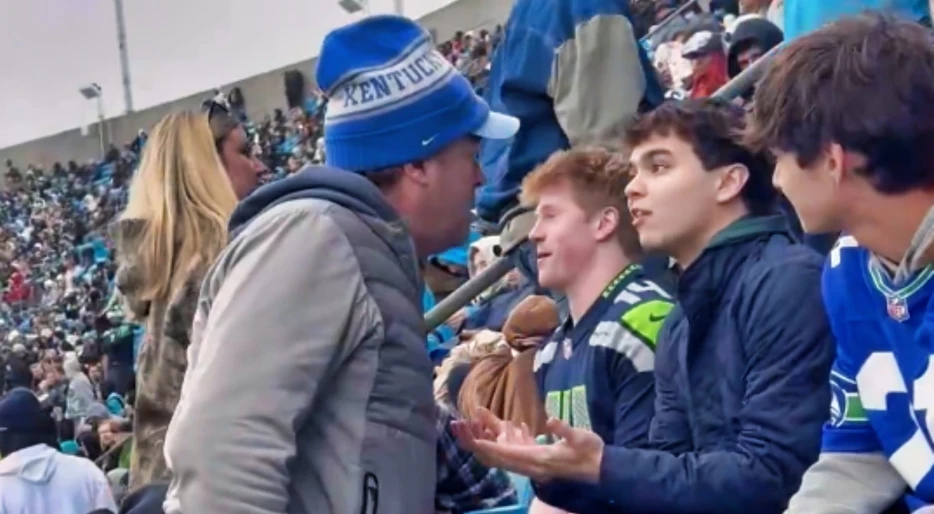 Adult Panthers Fan Threatens To Break Young Seahawks Fan’s Nose During Ugly Altercation In The Stands [VIDEO]