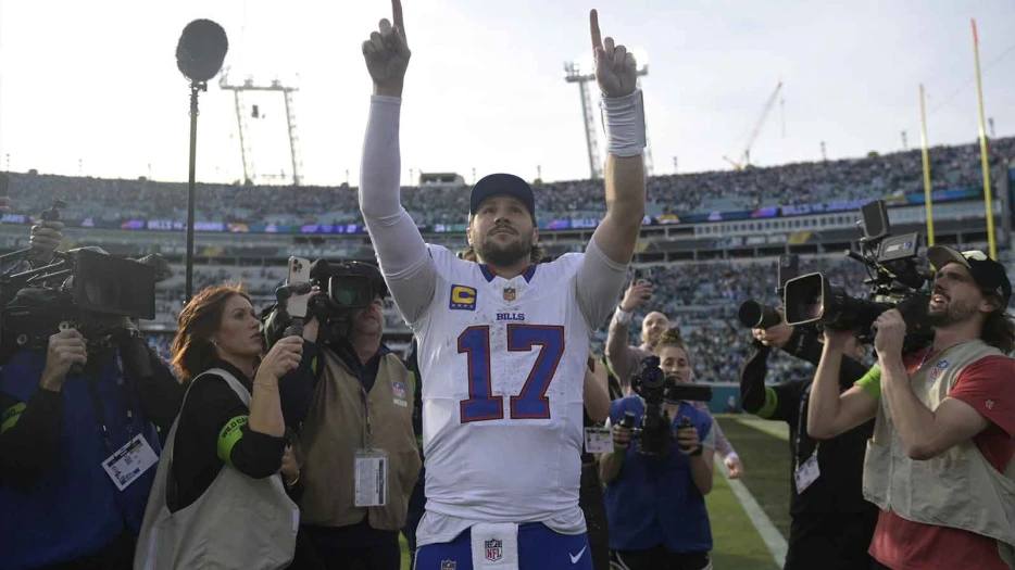 Josh Allen celebrating with Bills Mafia in Jacksonville is a scene