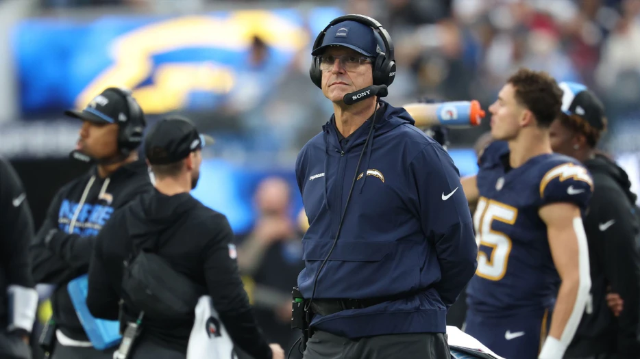 Chargers HC Jim Harbaugh skirts questions about Greg Roman’s future