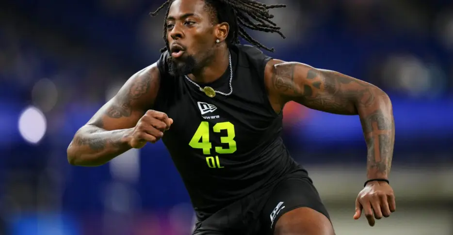 Patriots draft pick charged with domestic assault